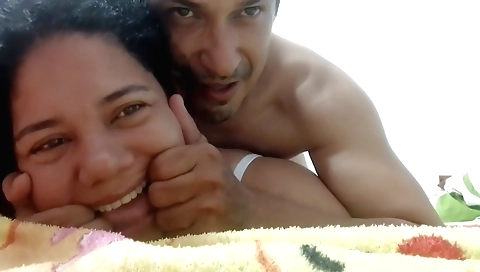 Buxom brunette is getting her tight ass filled with a dildo