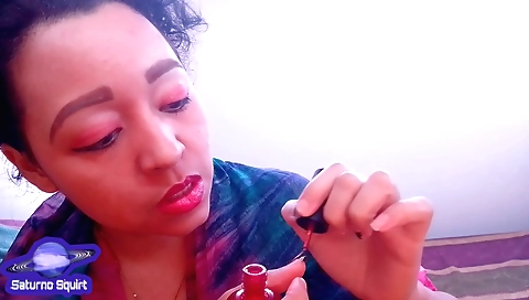 Brunette hairdresser paints her nails and does solo porn