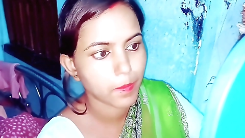 Slender brunette girl in a white blouse and pink bikini