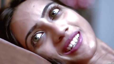 Horny brunette babe with big natural tits is showing us