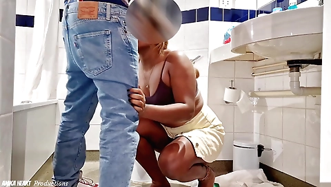 Busty redhead seduces a plumber in the hotel bathroom