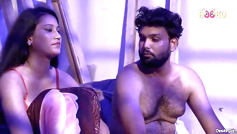 Sexy brunette with long legs is playing with her sexy legs