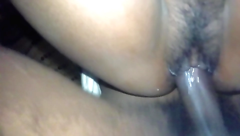 Hairy girl is giving a blowjob and a dick deep in her pussy