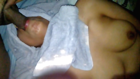 Indian brunette in a white lingerie giving a handjob