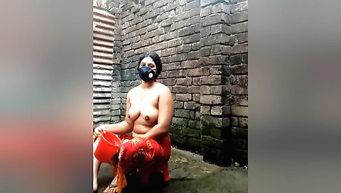 Indian brunette in a bathing suit gets wet and spread wide