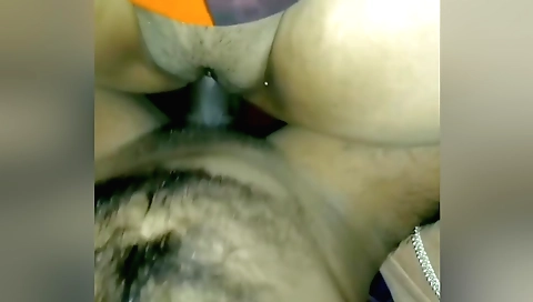 Indian hairy babe rides her lover's dick in a porn clip