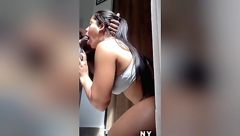 Amateur brunette model gives a surprise blowjob to a stranger