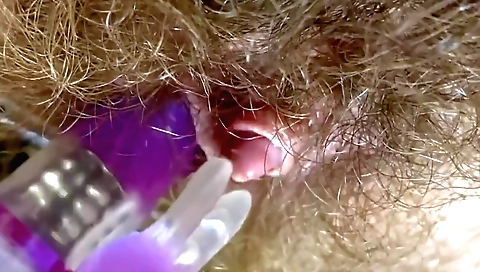 Young and old woman is showing her hands and her dildo