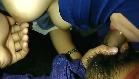 Teen in bikini sucking on a large cock in front of the camera