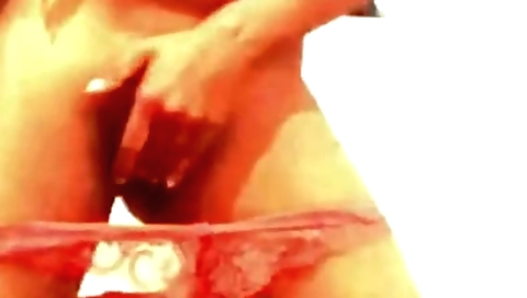 Red bikini beauty spreads legs and plays with her cunt