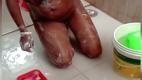 Amateur brunette shows off her wet pussy in the shower