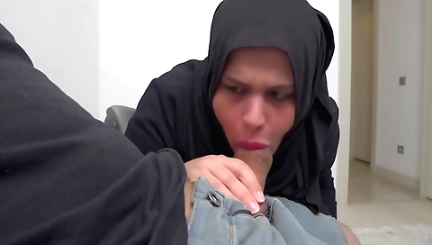 Naked woman in hijab on the webcam jerking off on the screen