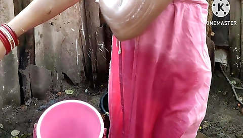 Indian housewife wearing a sexy white bra and white skirt