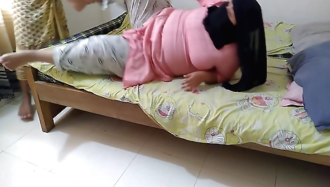 Indian teacher with a big boobed student in her classroom