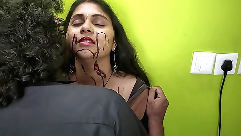 Indian girl with a nice face and small tits enjoys a chocolate lick