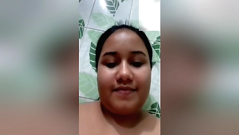 Busty brunette babe shows off her tits on the webcam