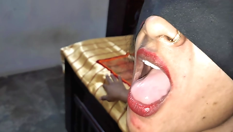 Amateur brunette with a beautiful face sucking a load of cock