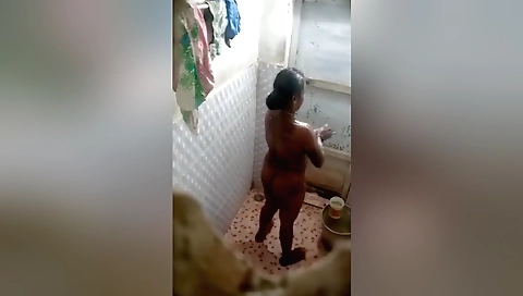 Bathing video shows a sexy brunette with a big booty