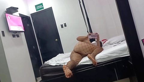 Busty brunette with a sexy body seducing guys in a club