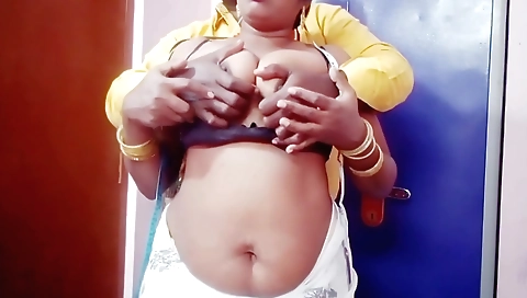 Brunette amateur handing a guy a handjob in front of webcam