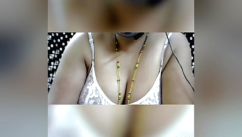 Curly Indian teen in a red saree riding a big dildo