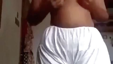 Beautiful brunette beauty gets naked in front of webcam