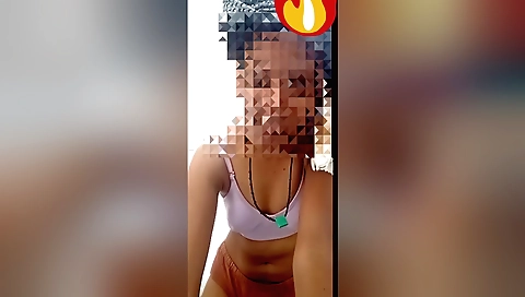 A brunette in her amateur video makes a phone call