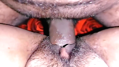 Mature stepmom is giving a blowjob to a young guy 1