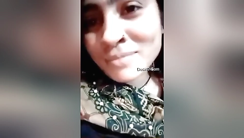 Busty brunette babe with nice boobs shows off her body