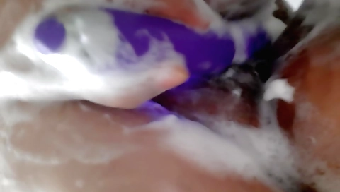 Sexy girl with a hairy pussy shows off how to shower her face